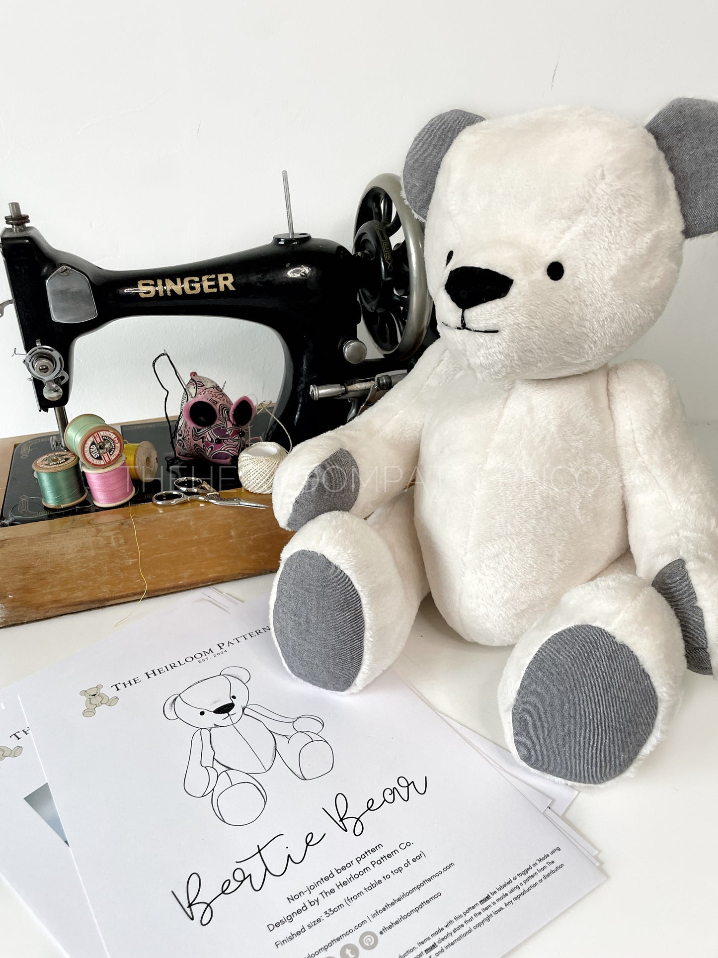 Bertie Memory Bear with vintage signer sewing machine and printed copy of the pattern.